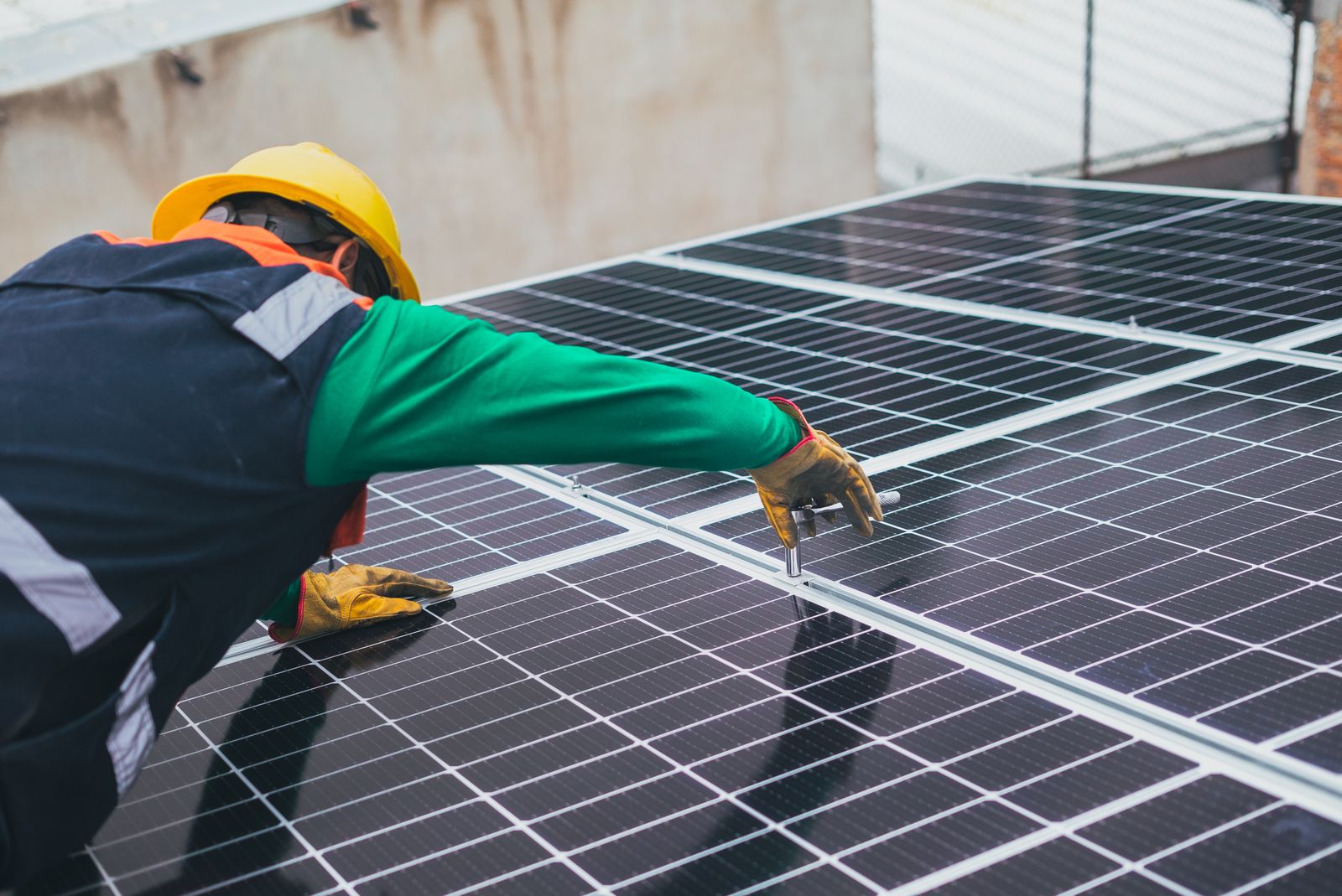 VertX crew member securing panels during an installation